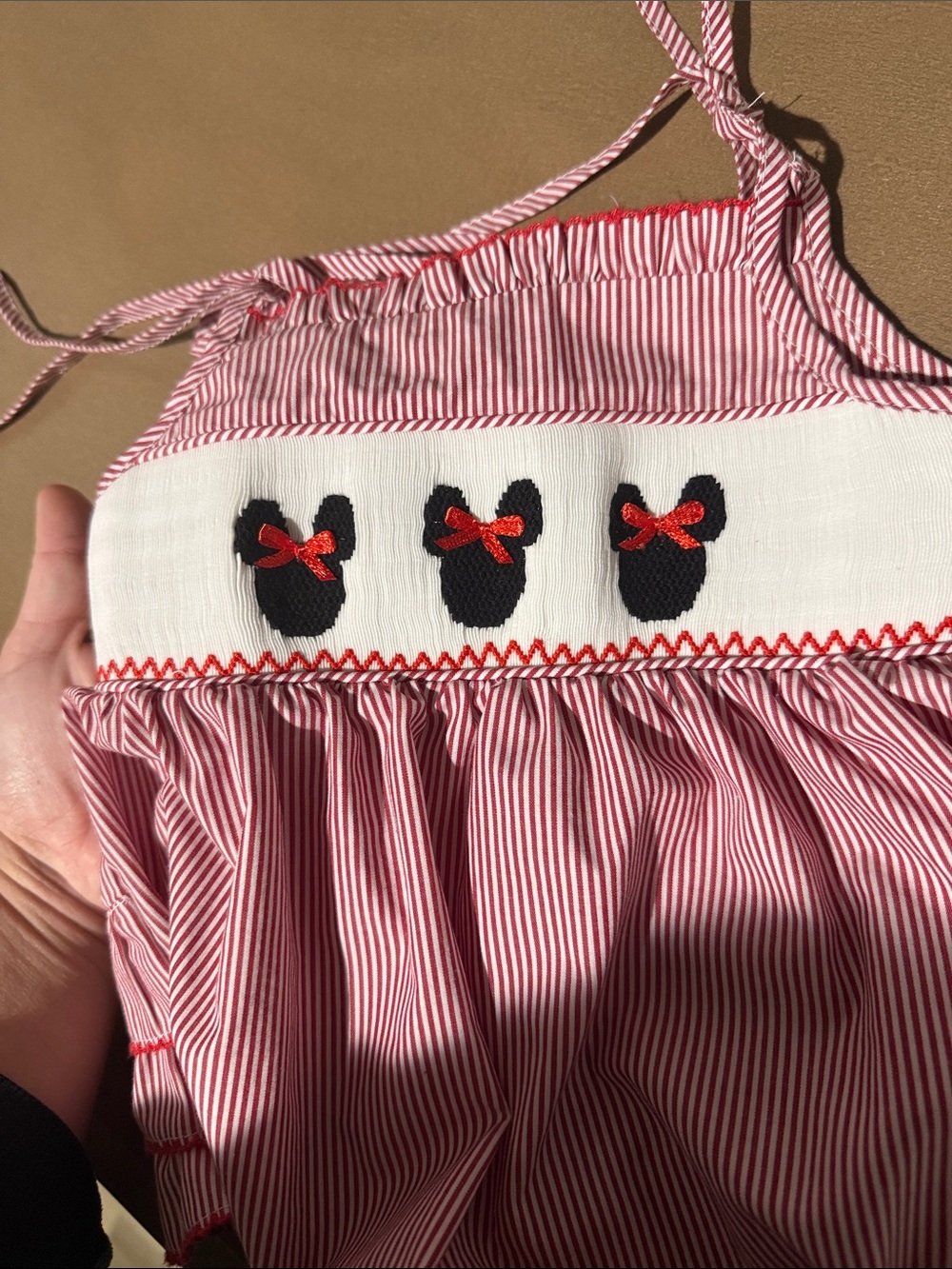 Stitchy Fish Red Striped Baby Romper with Minnie Mouse and Bow Accents - Picture 2 of 6